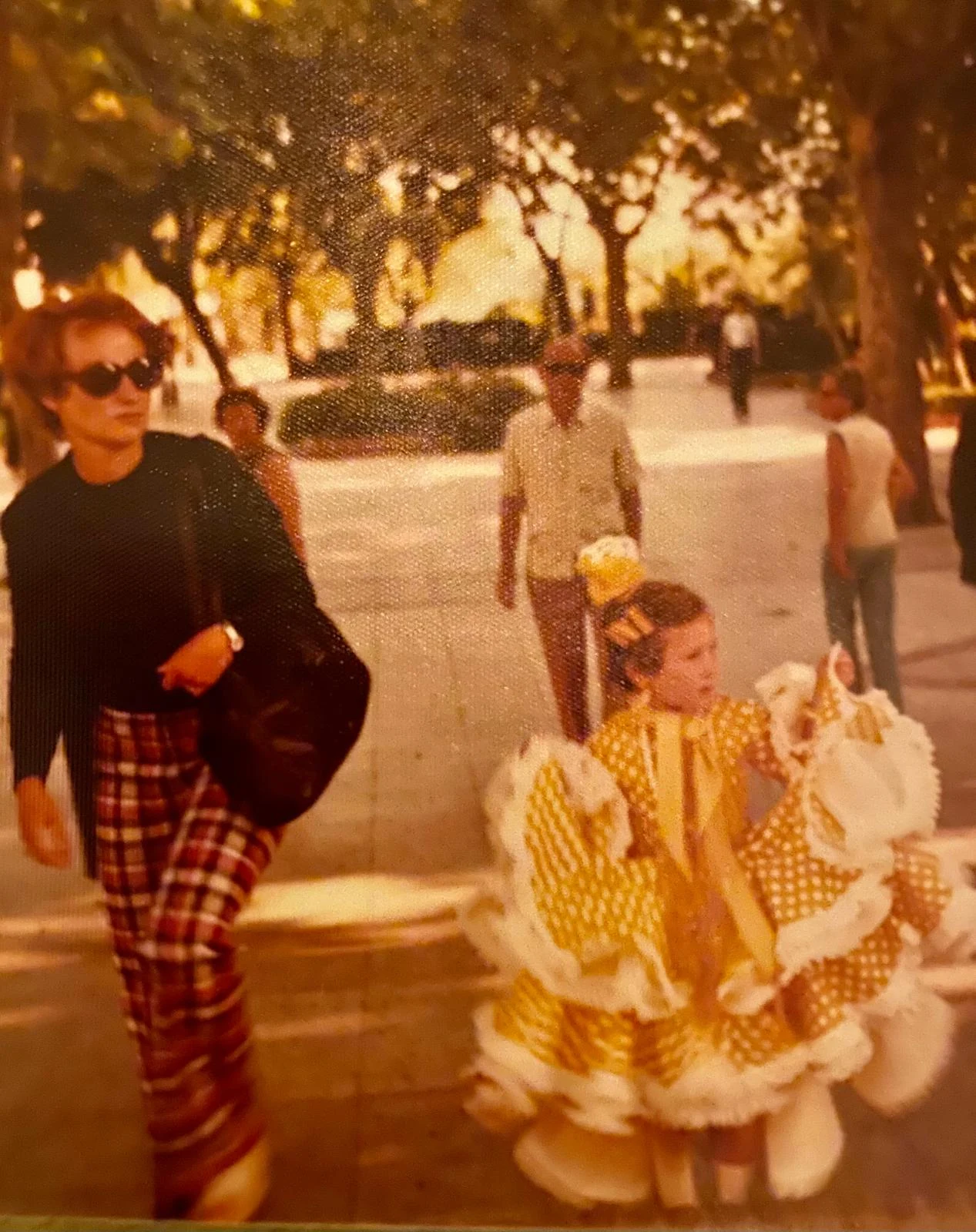 Nicole as a child in a traditional feria dress in Málaga, 1974